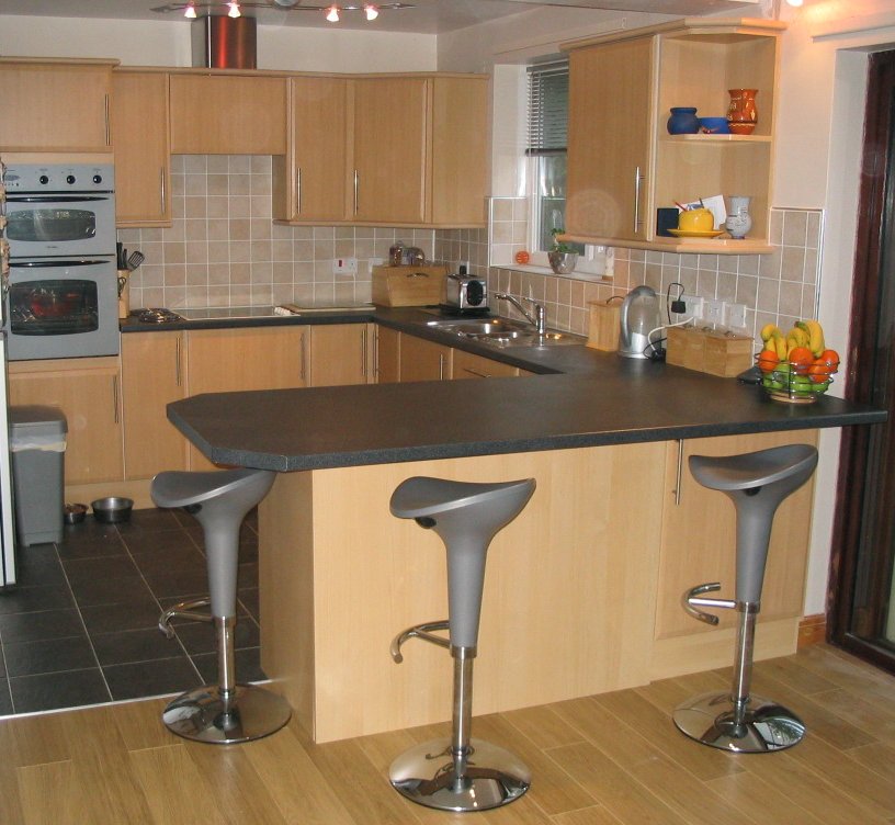 Complete kitchen renovation with wall and floor tiling & V groove laminate 